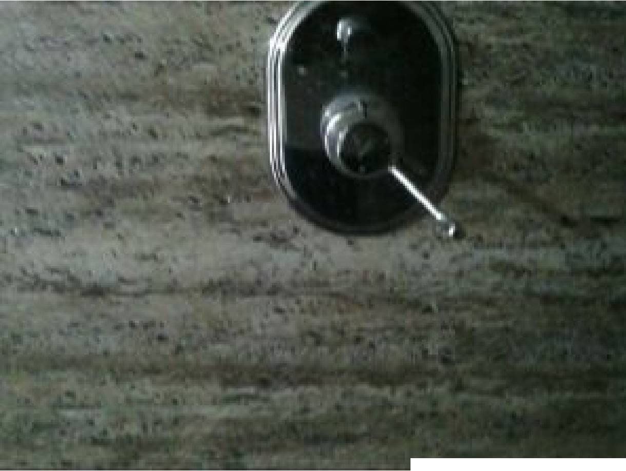 Visible-light photograph of the common washroom fitting paired with thermal capture RB00010X